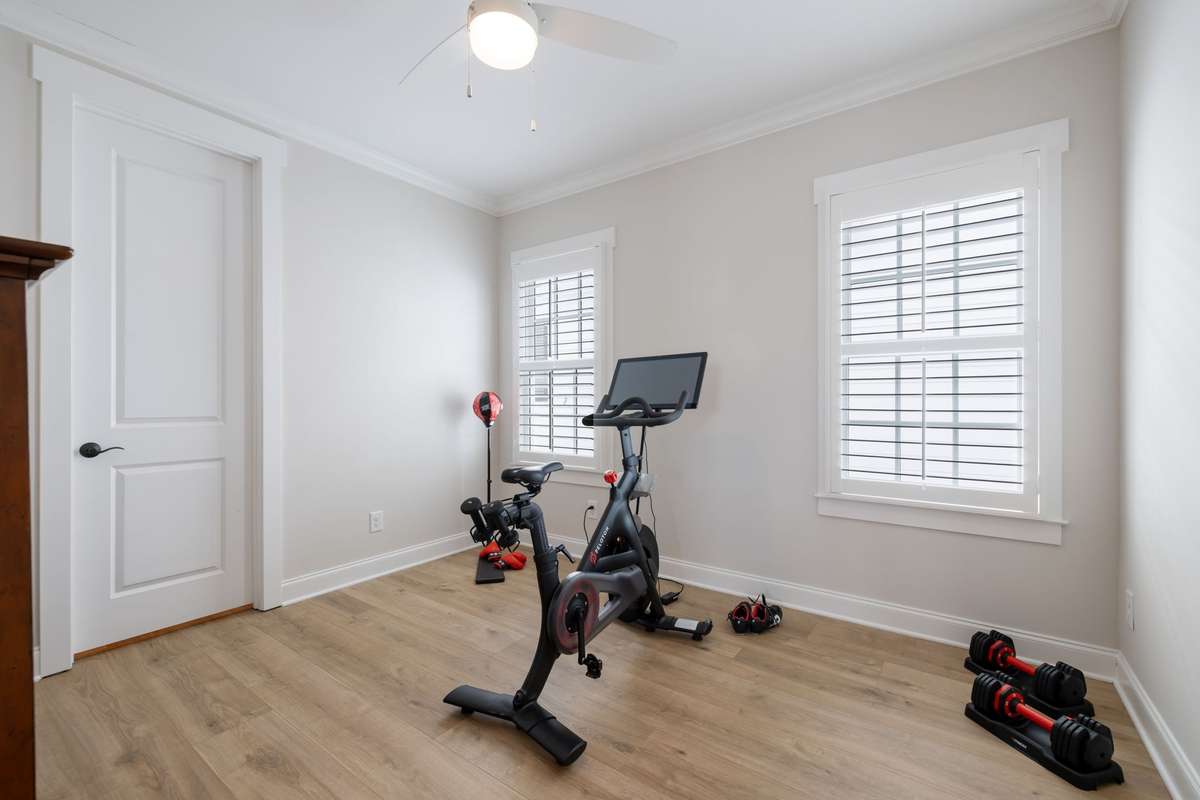 Bedroom 4 currently being used as an exercise space.