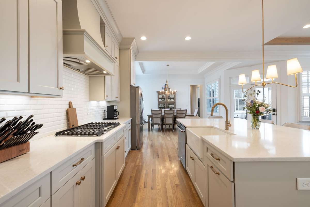 Gas cooktop with vent hood.