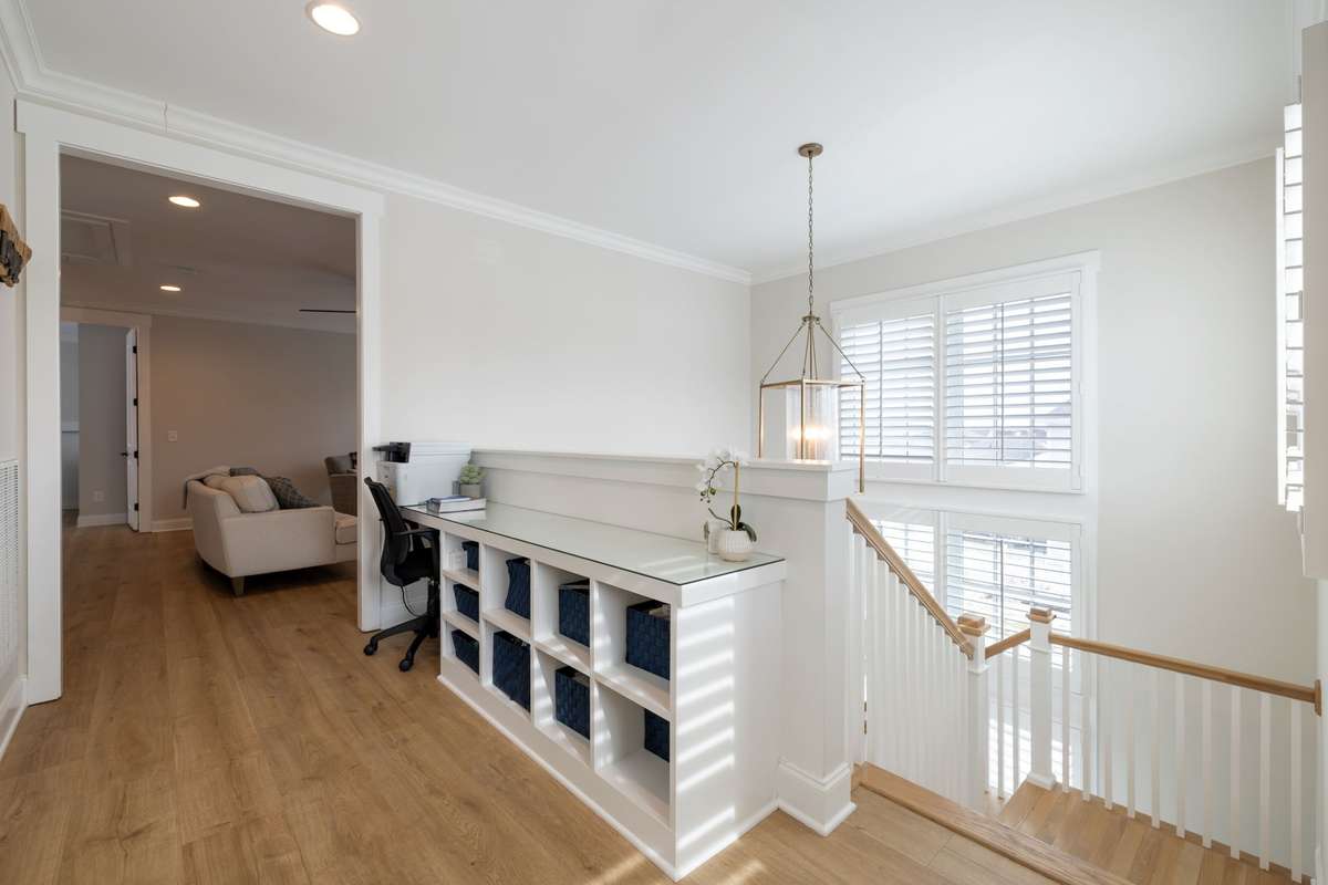 Built in office or hobby area at the top of the stairs.