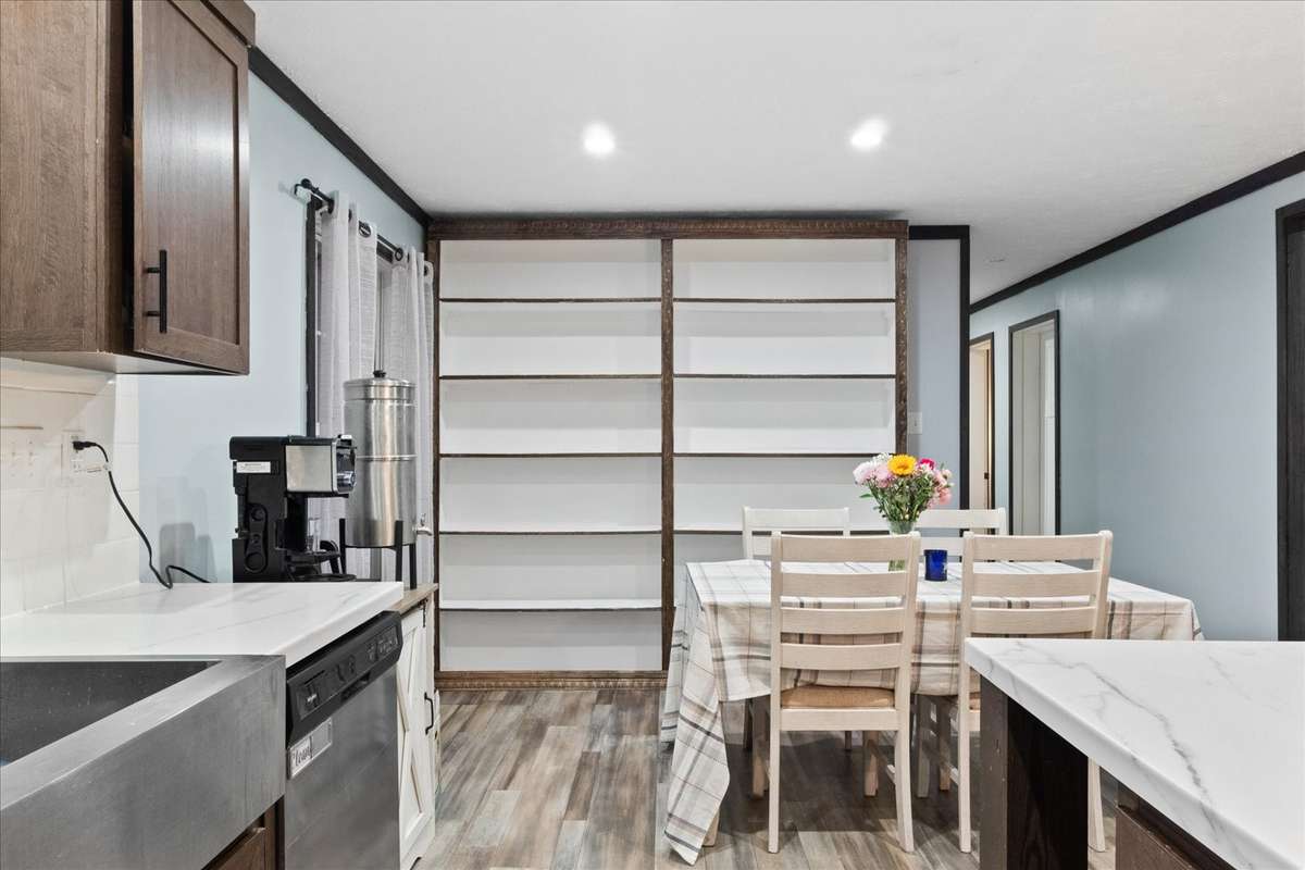 Bookcase in Dining Room can stay, movable (could be move to den)