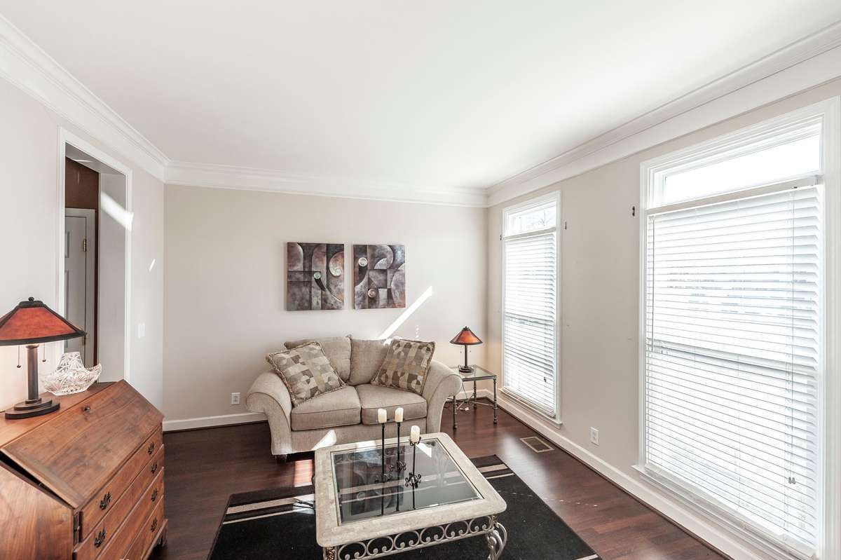 Formal living room with crown molding