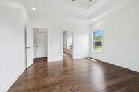 ...and another view of the Primary Bedroom looking toward the bathroom suite...