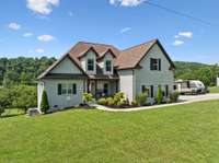 The surrounding hills offer the most relaxing views from this front porch...