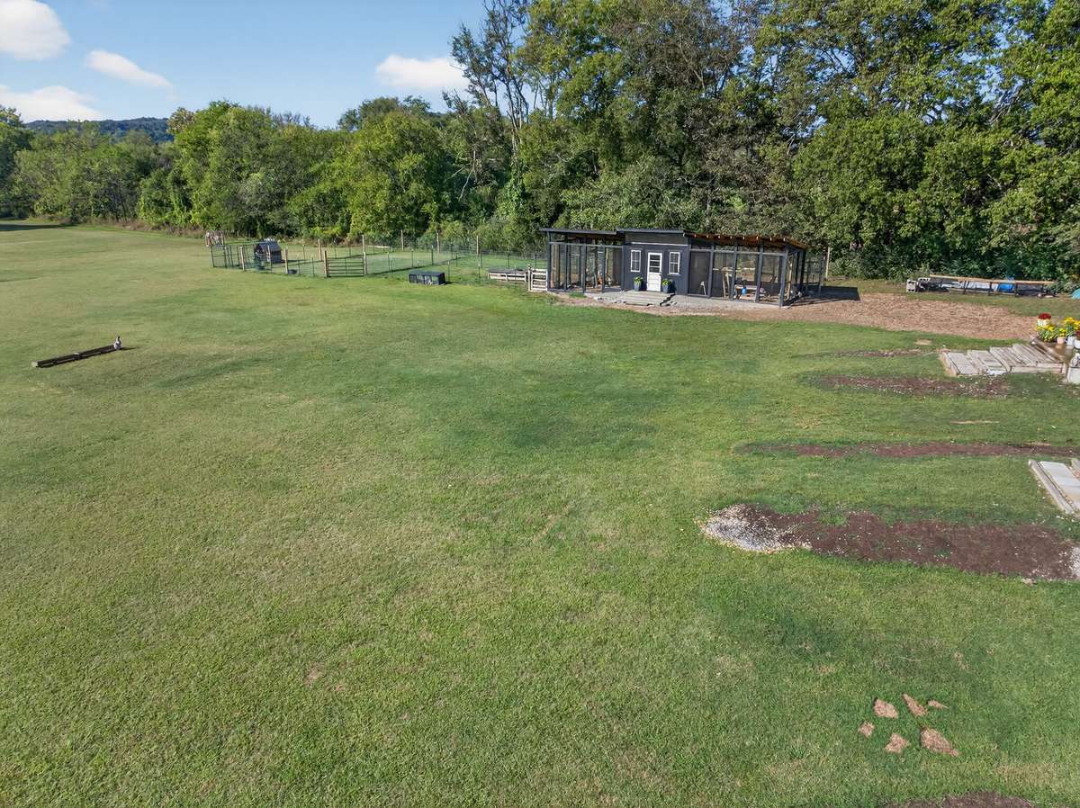 Expansive back yard with chicken coop