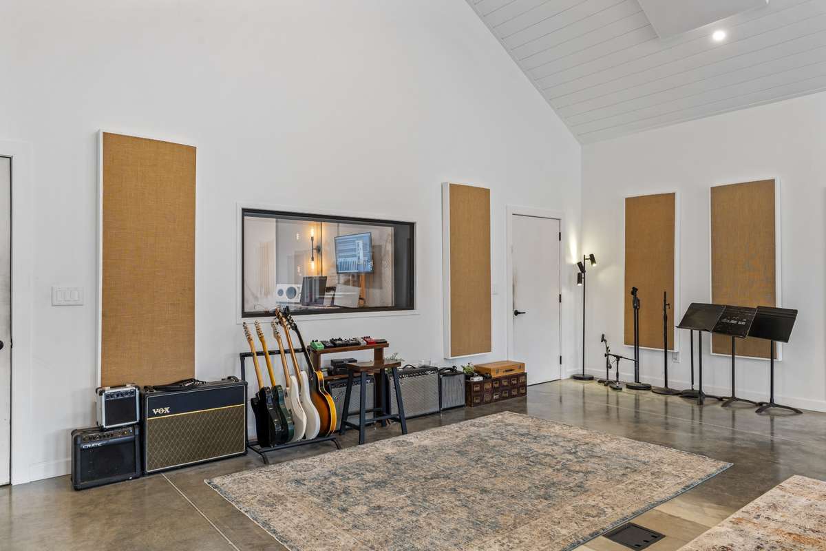 Professional music studio, showing window into control room