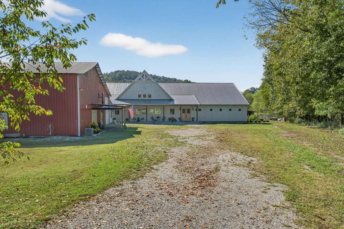 Front of home.  Barn and home are conveniently designed so that you don't have to go outside to enter one from another.