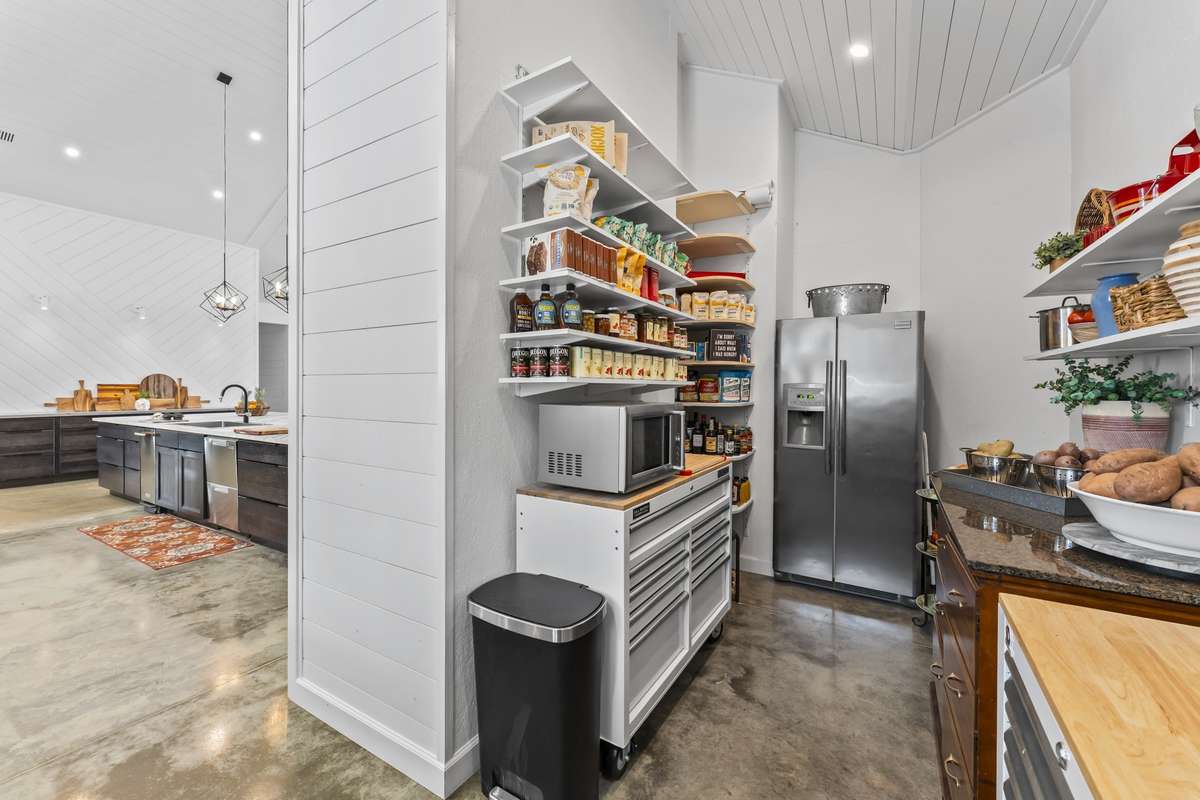 Large pantry with extra refrigerator/freezer