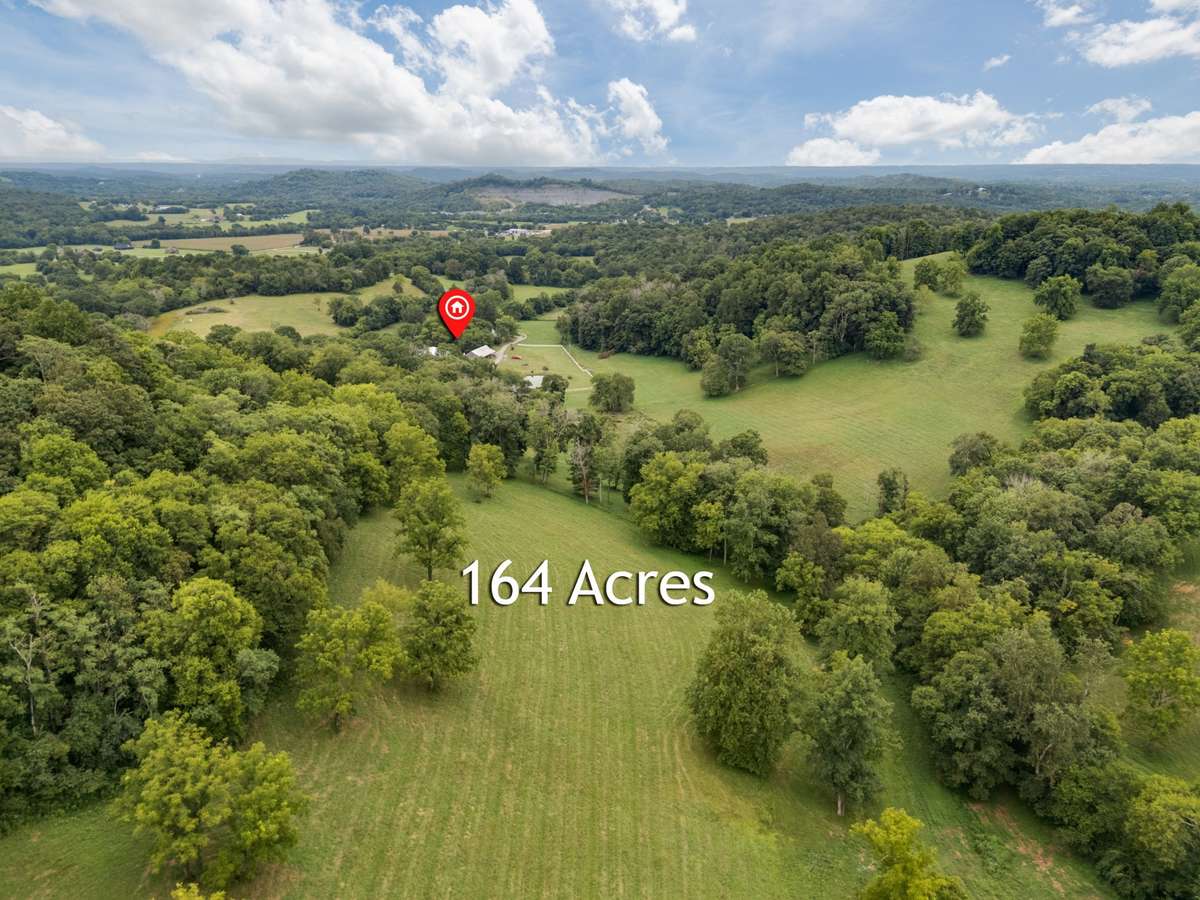 An extraordinary 164-acre landscape of rolling pasture and mature woods, offering unmatched privacy, breathtaking views, and the scale to support a legacy estate, working farm, or premier event destination.