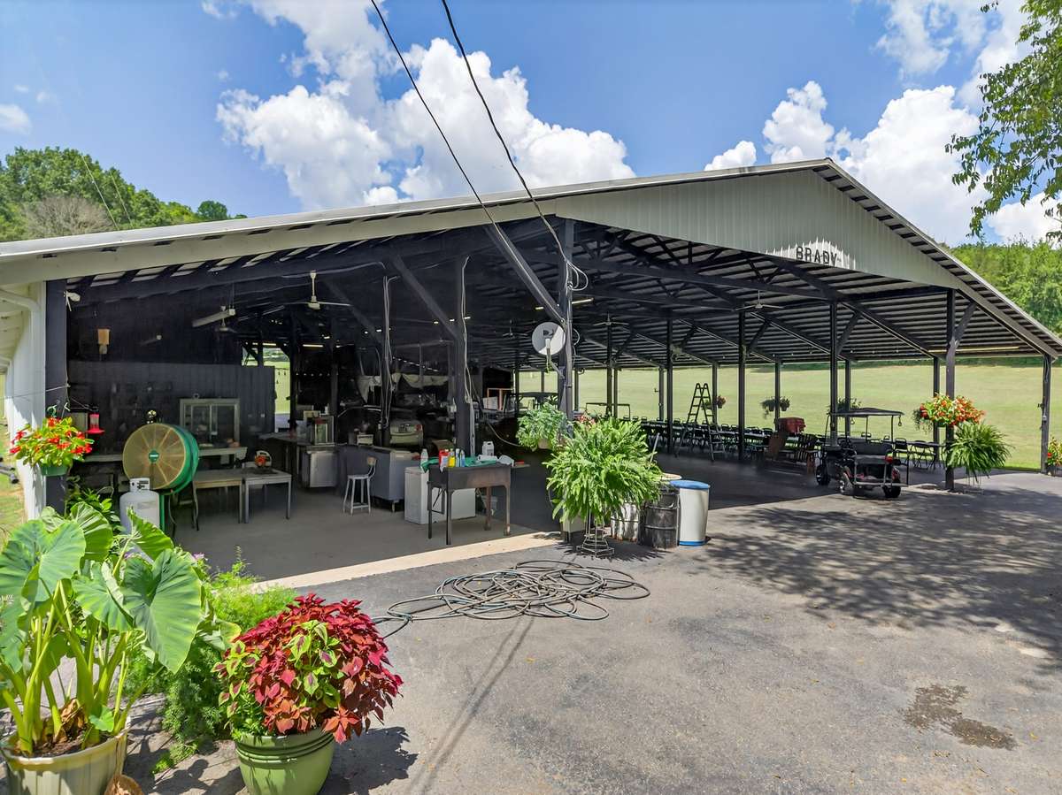 The pavilion also features dedicated guest and RV-accessible restrooms, including multiple stalls and private walk-in showers on both the men’s and women’s sides—ideal for large gatherings and extended stays.