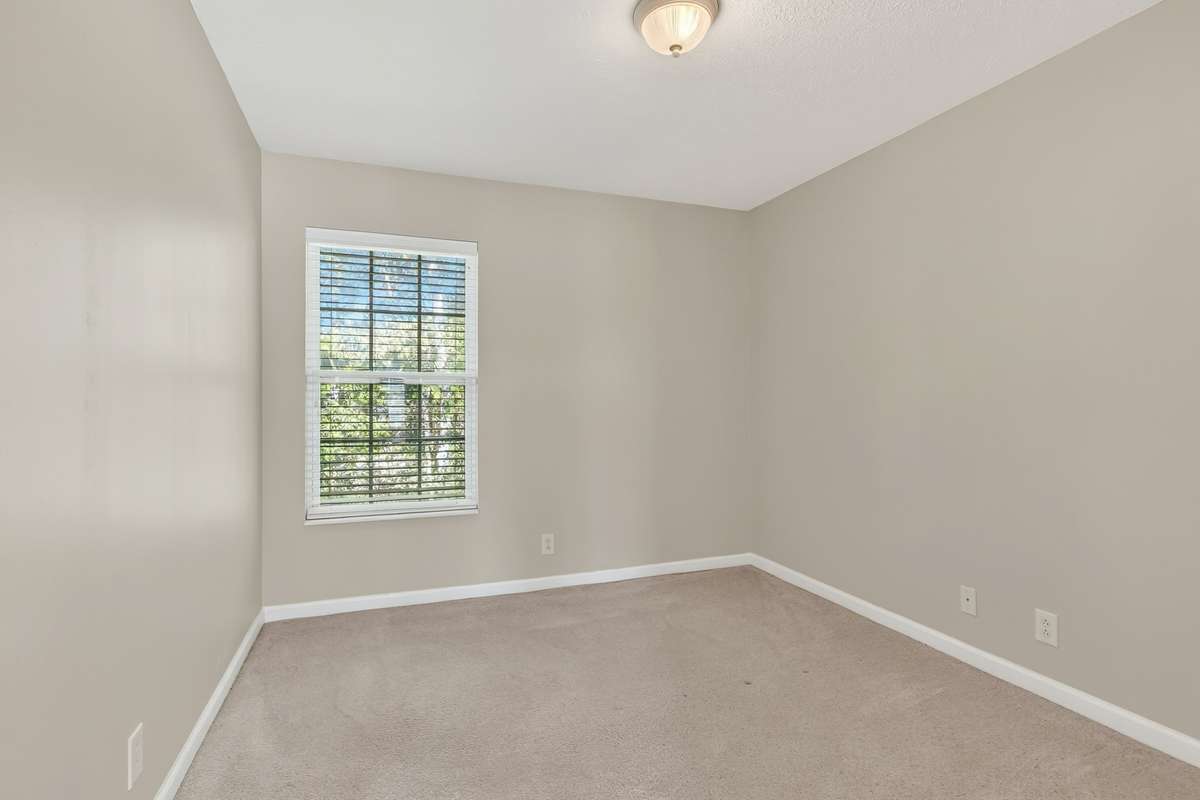 There are two other spare bedrooms upstairs. . . this one overlooks the backyard