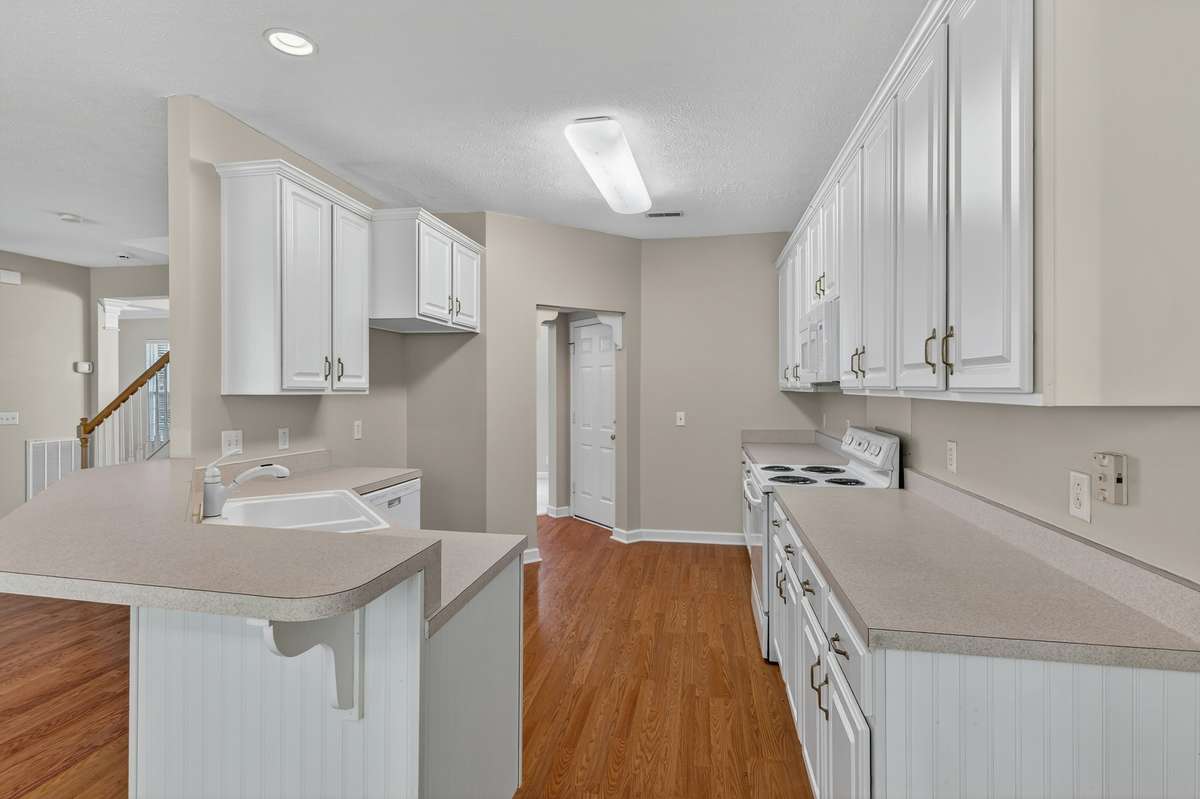 Tons of cabinets and counter-top space plus pantry
