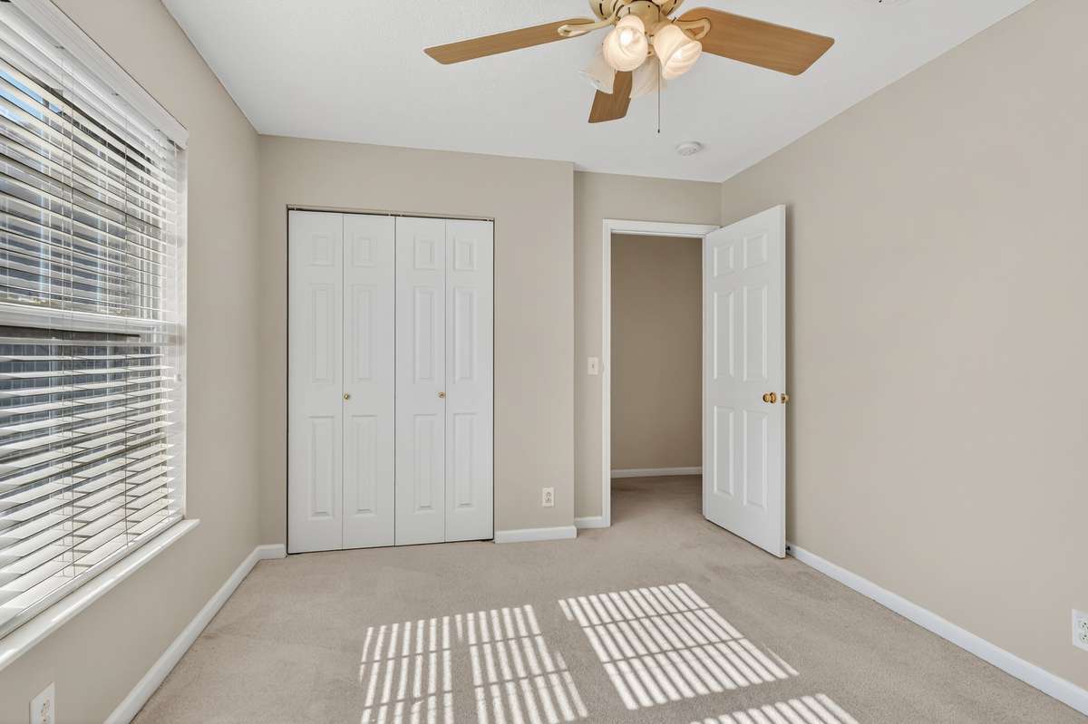 Another view of the spare bedroom overlooking the front yard