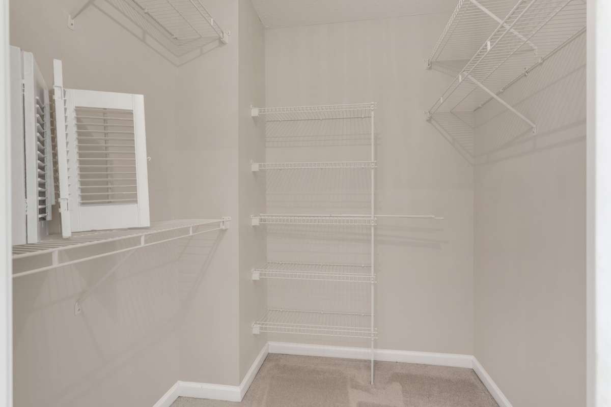 One of two walk-in closets in the primary bathroom