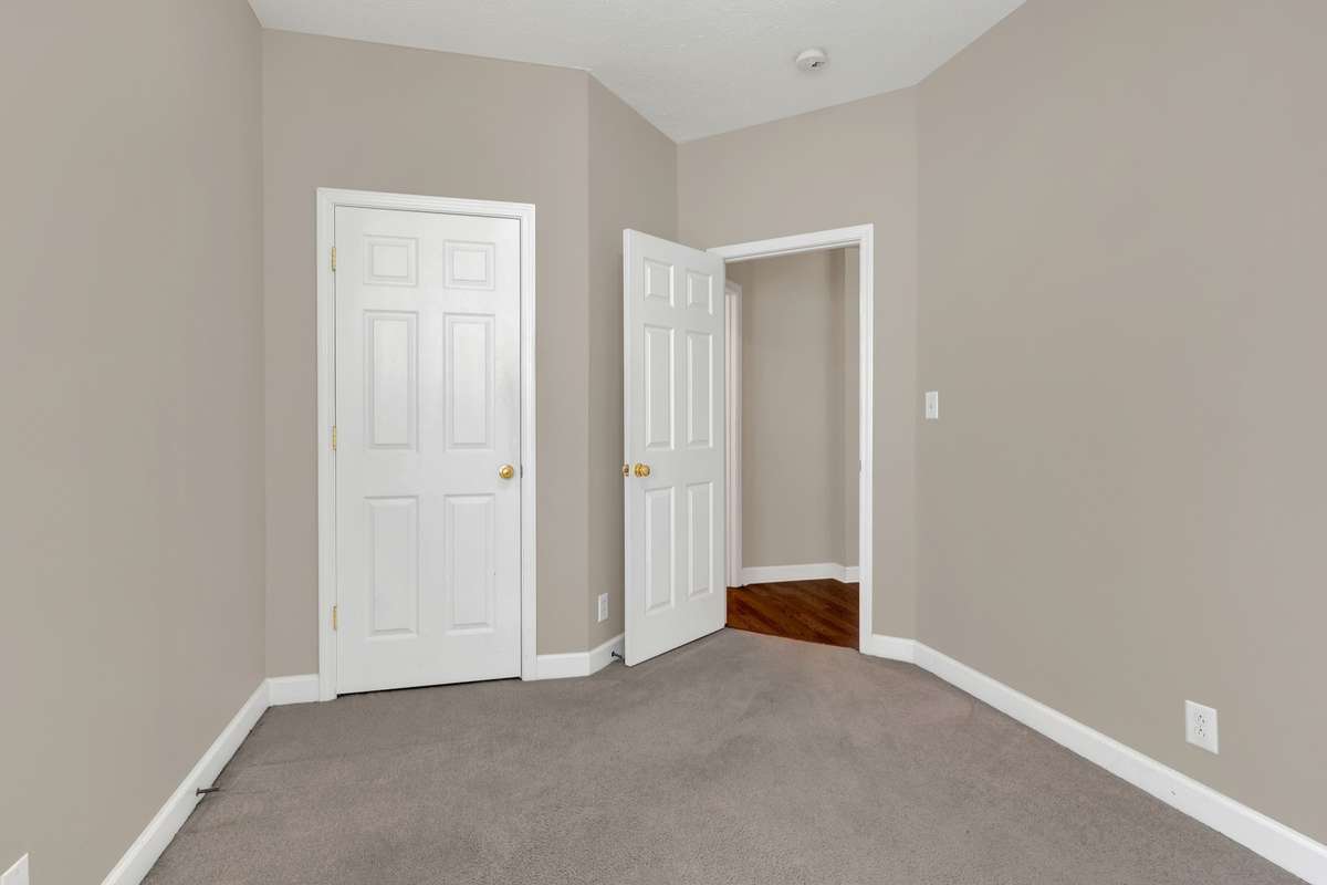 Another view of the main level spare bedroom . . . fresh new paint throughout the home