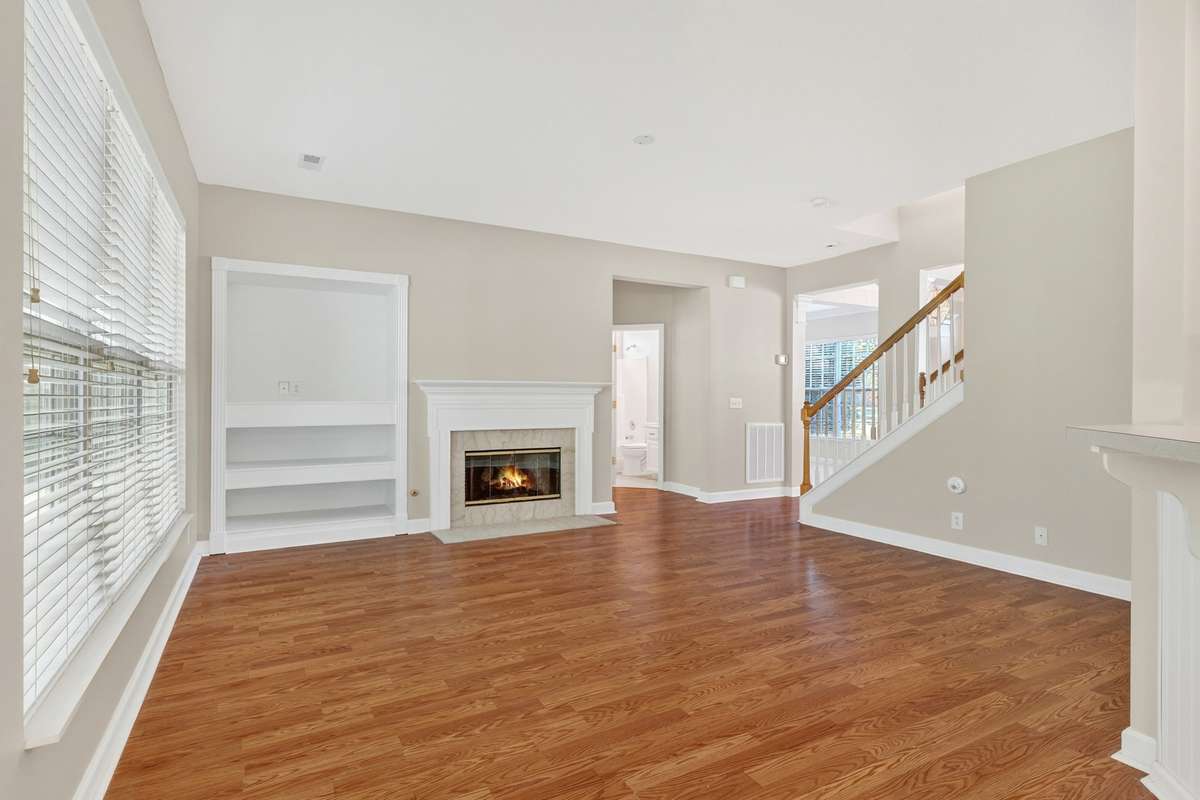 Family room has fireplace with gas logs