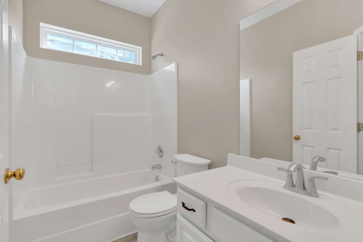 Three full bathrooms in the home. . .  this one on the main level!  Clean, fresh and ready!