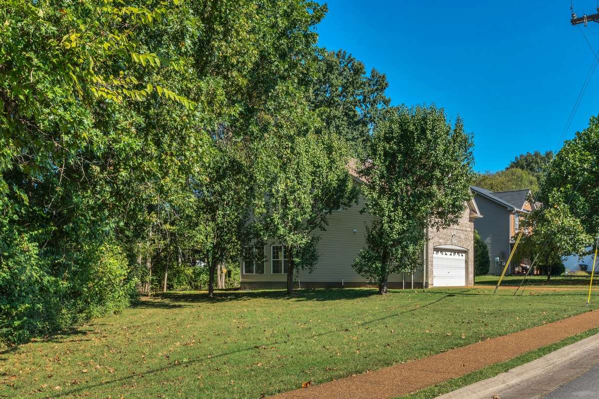 Home has common area to side that will never be built on. . . great extra space to enjoy and play.  Plus, some common area behind part of the home. Very private backyard