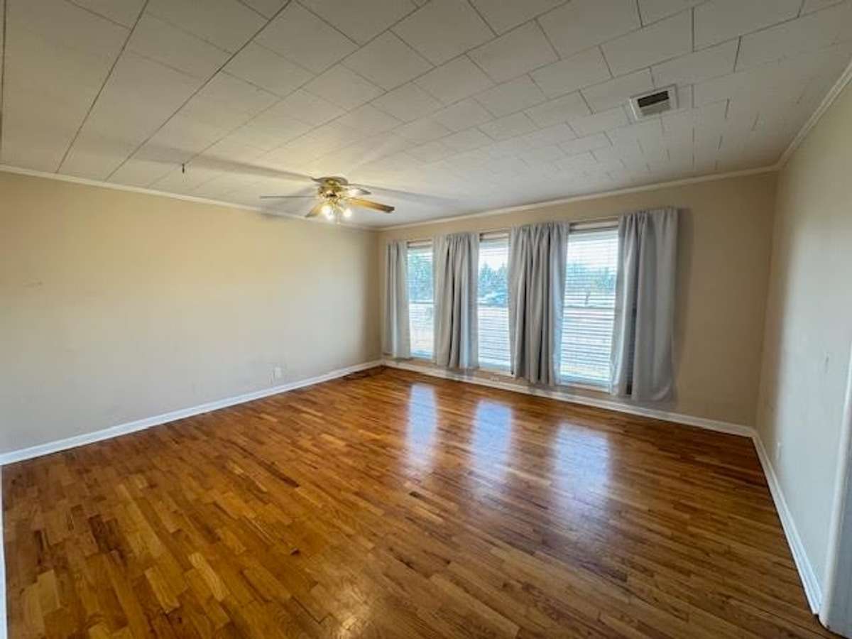 Large Primary Bedroom will fit King size bed as well as your dressers. Floor to ceiling windows.