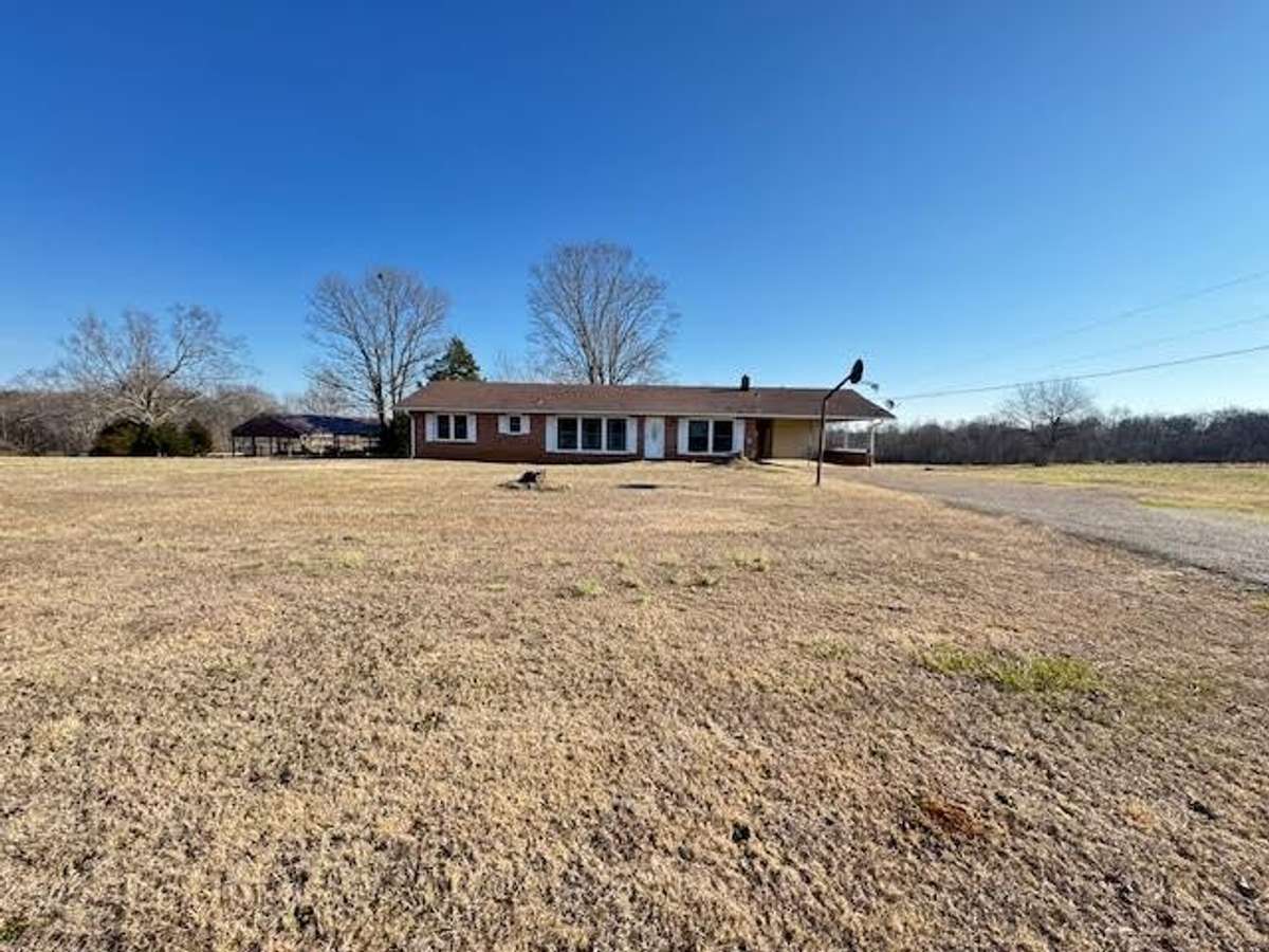 Nice rural setting with open fields around the house