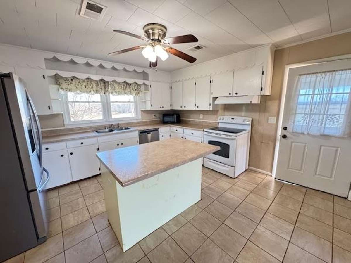 Tile flooring and smooth surface stove