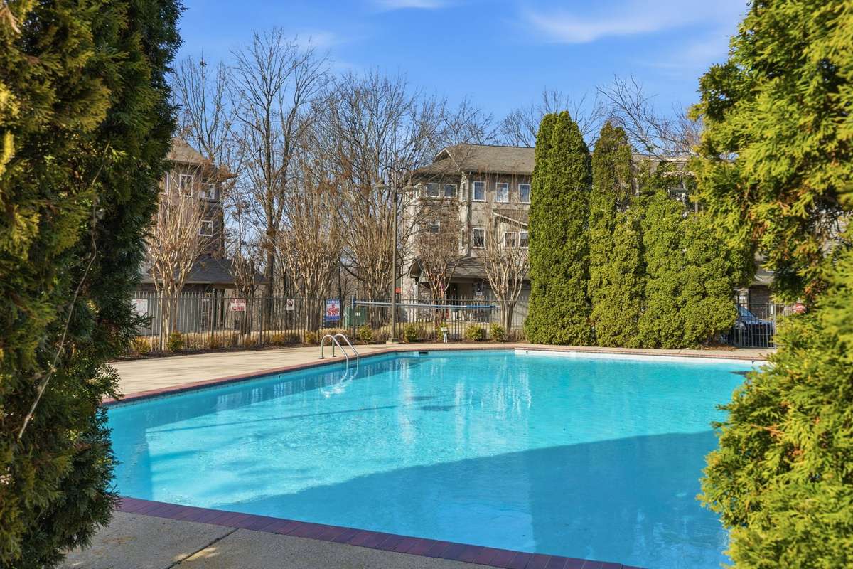 Enjoy access to a beautiful community pool — perfect for summer living at its finest.