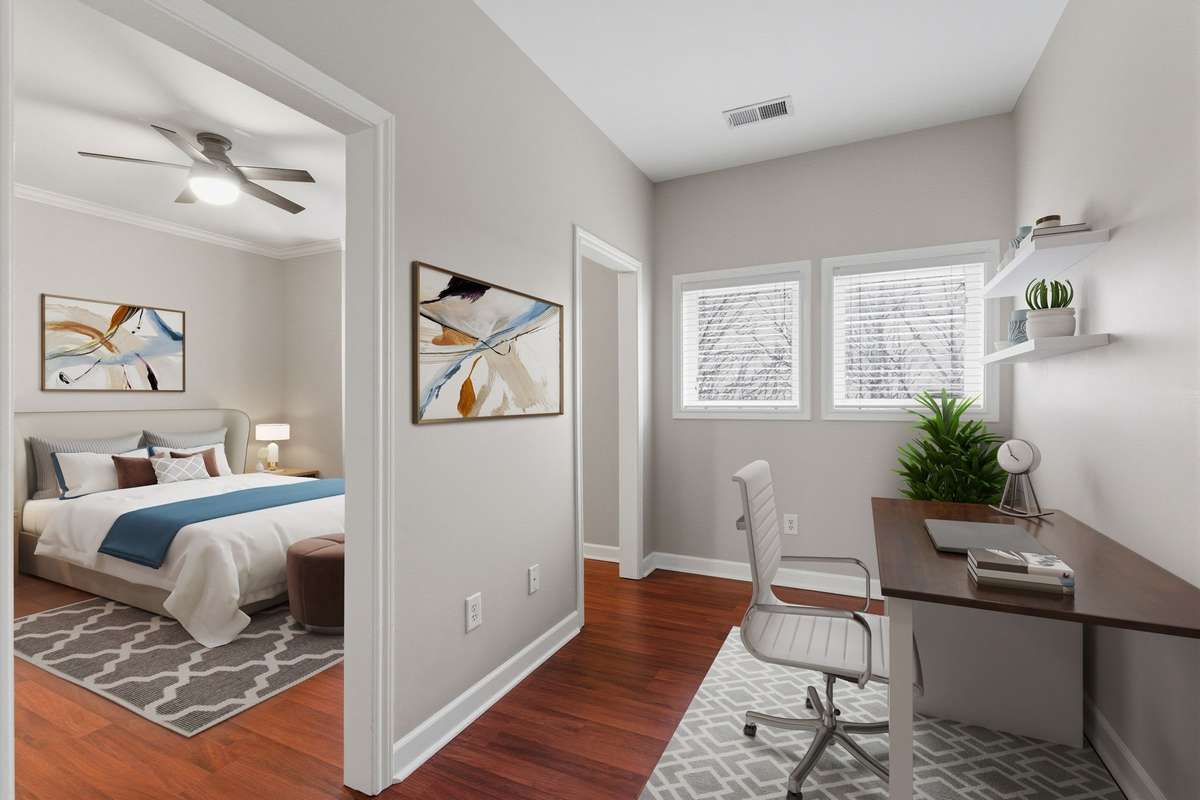 At the top of this multi-level layout, you’ll find a private primary retreat and an additional flex space — perfect for a home office, workout area, or nursery. (Virtually staged.)