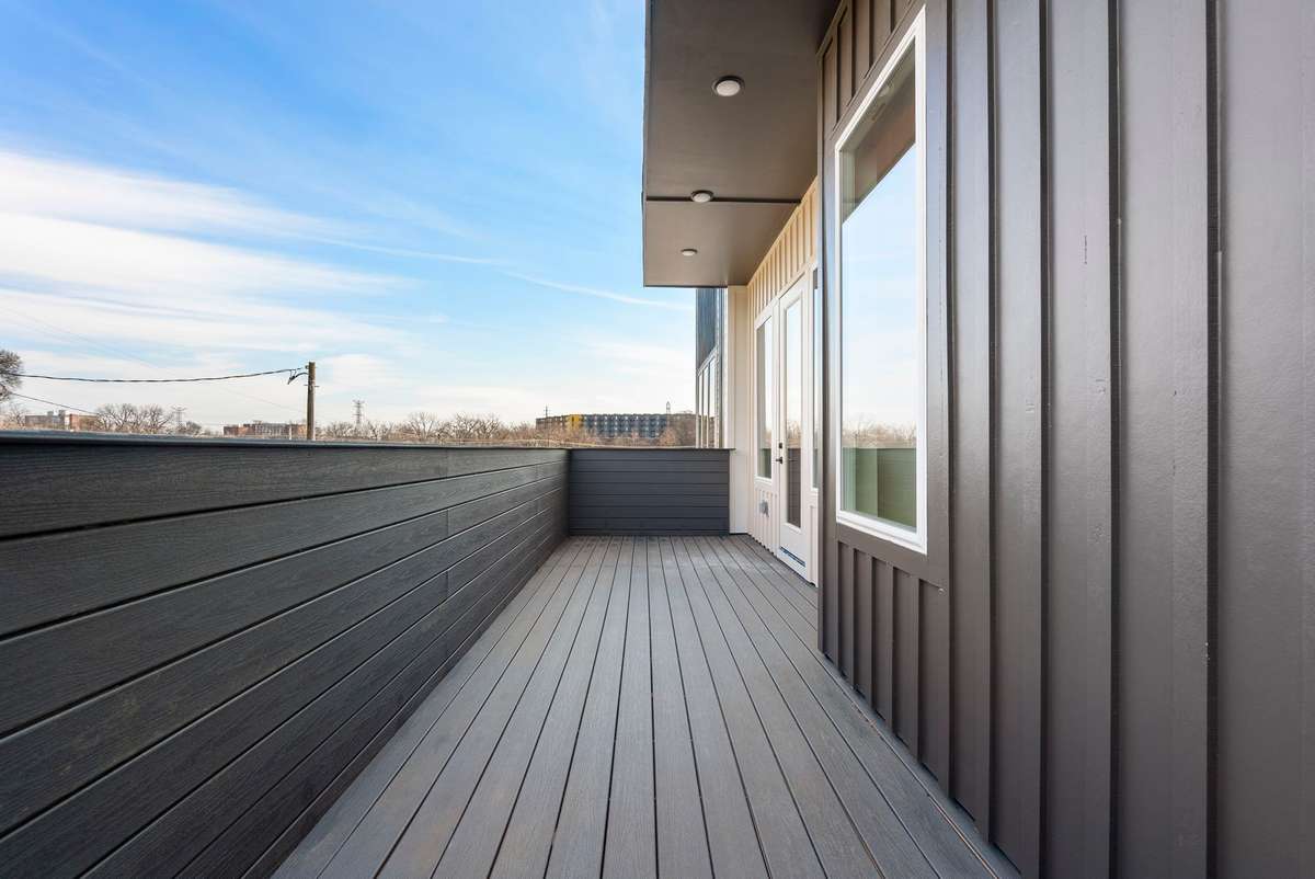 Unit 100 features a walk out balcony!