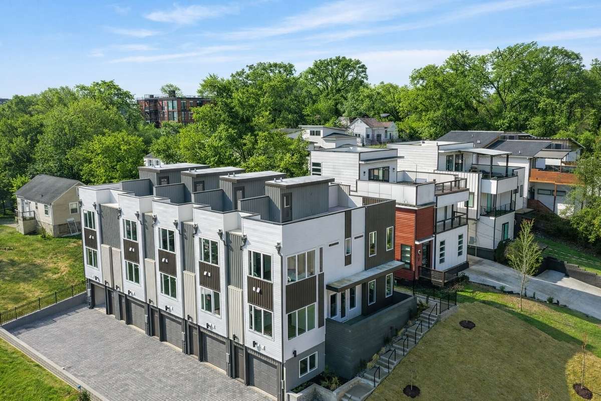 Each residence features a private rooftop retreat—now enhanced with turf for a clean, low-maintenance finish.