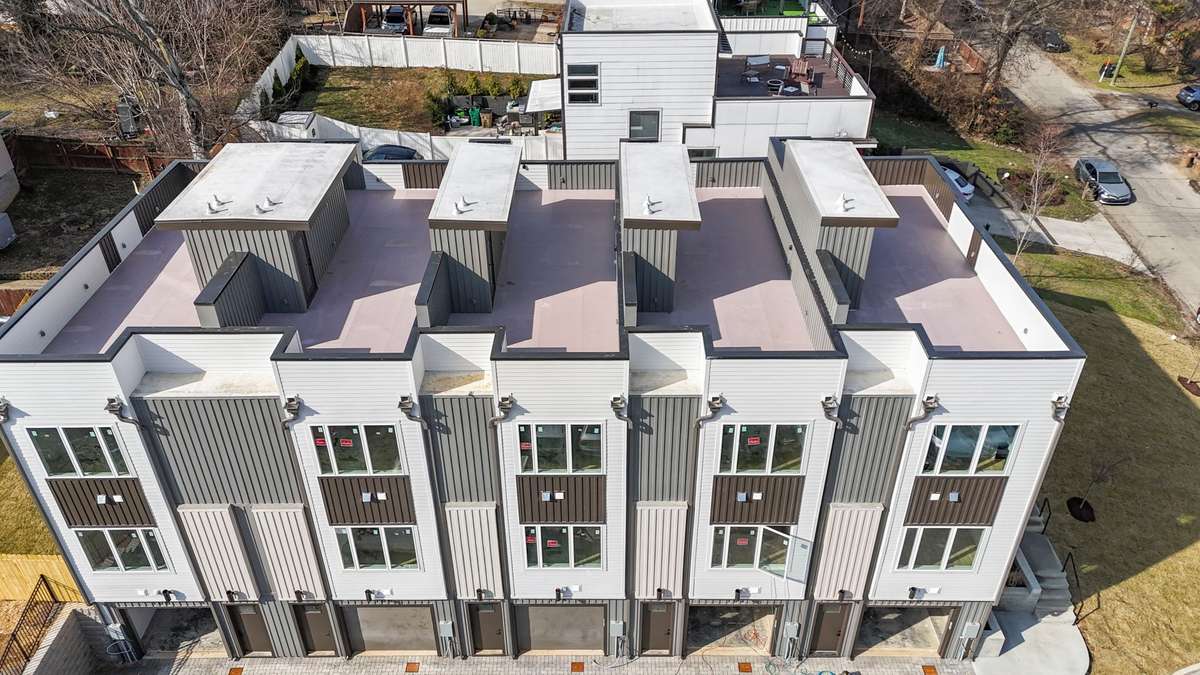 Each residence features a private rooftop retreat—now enhanced with turf for a clean, low-maintenance finish.