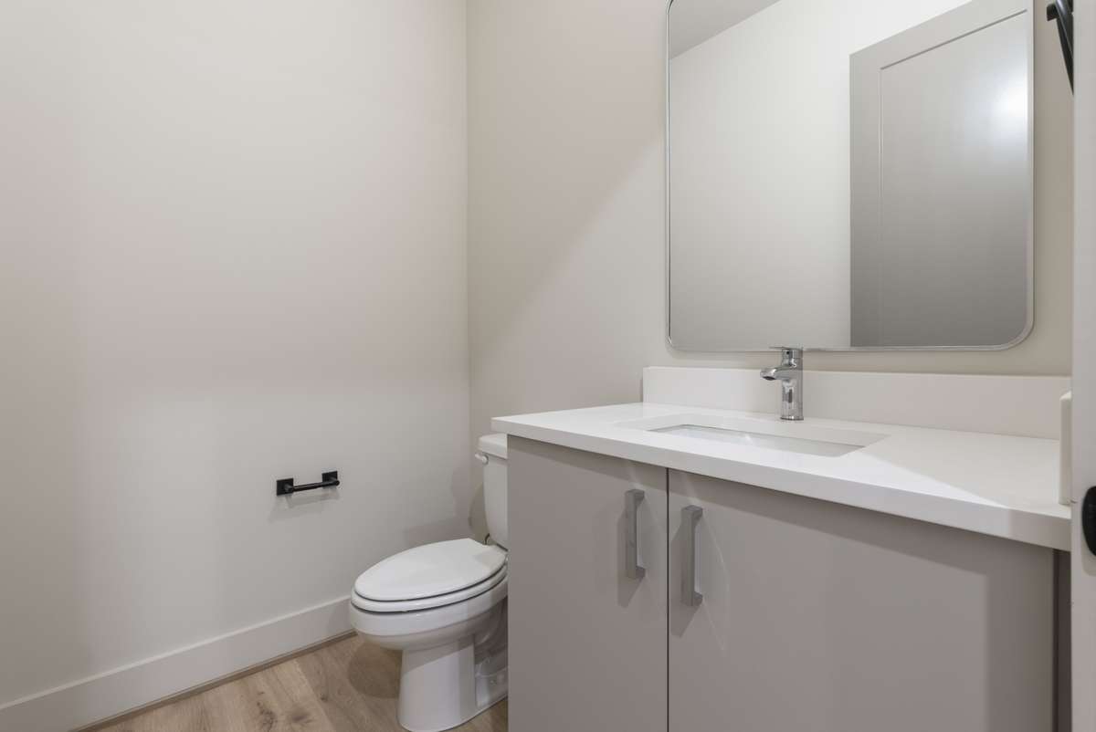 Interior photos are from Unit 100 and highlight the craftsmanship, finishes, and design buyers can expect.