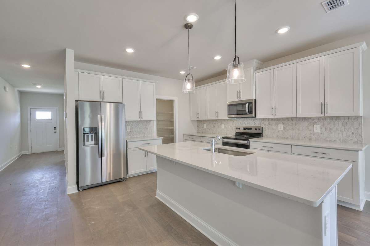 Photo is not of the actual home, but is an inspirational photo of builder’s model home and may depict options, furnishings, and/or decorator features that are not included