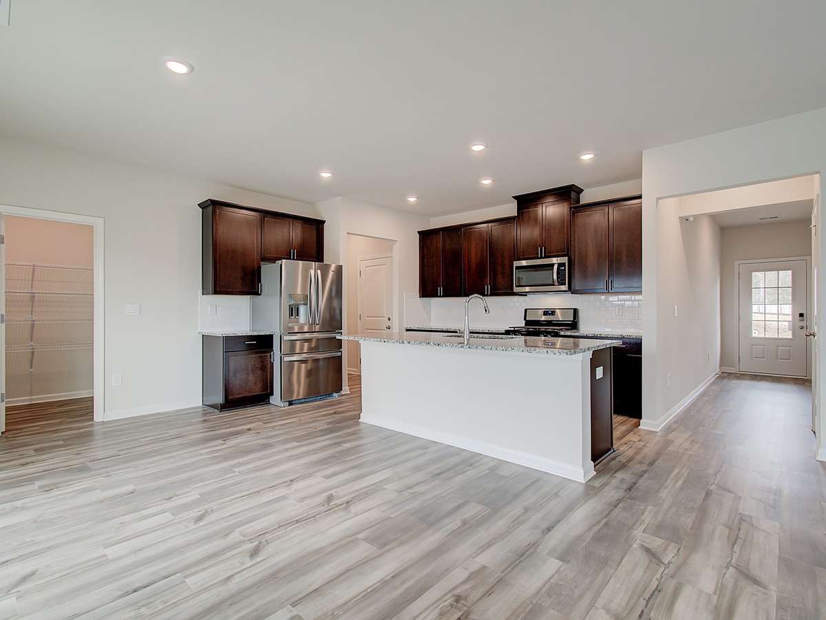 Photo is not of the actual home, but is an inspirational photo of builder’s model home and may depict options, furnishings, and/or decorator features that are not included