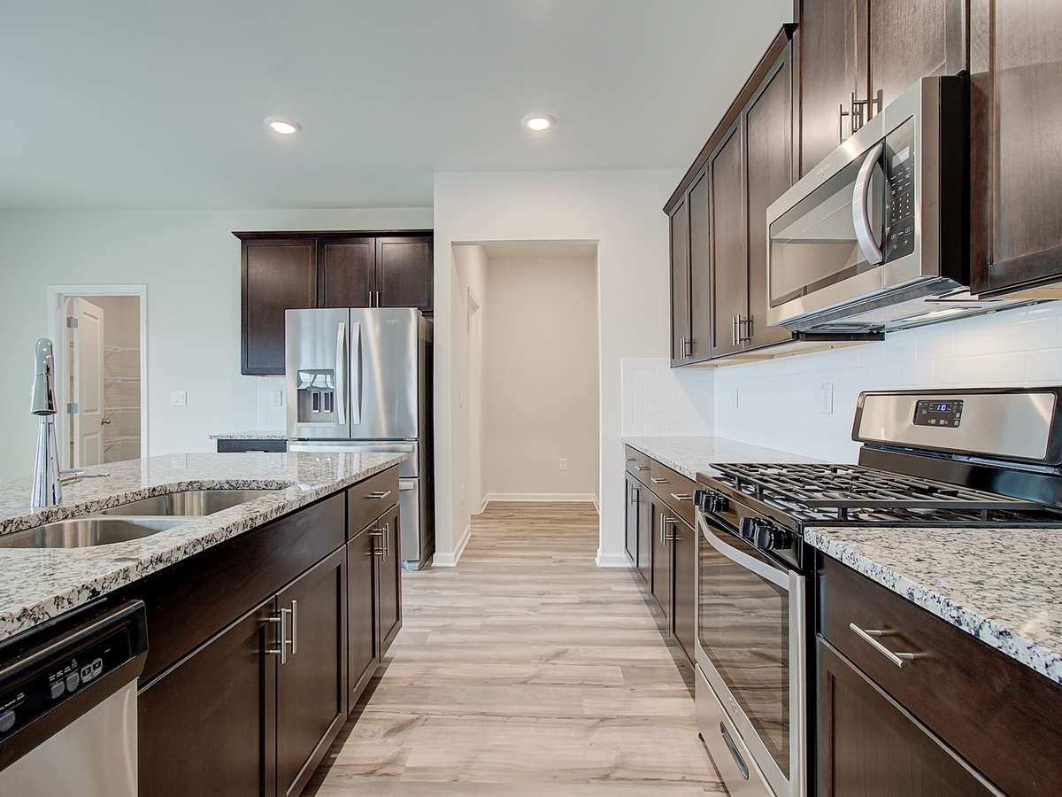 Photo is not of the actual home, but is an inspirational photo of builder’s model home and may depict options, furnishings, and/or decorator features that are not included