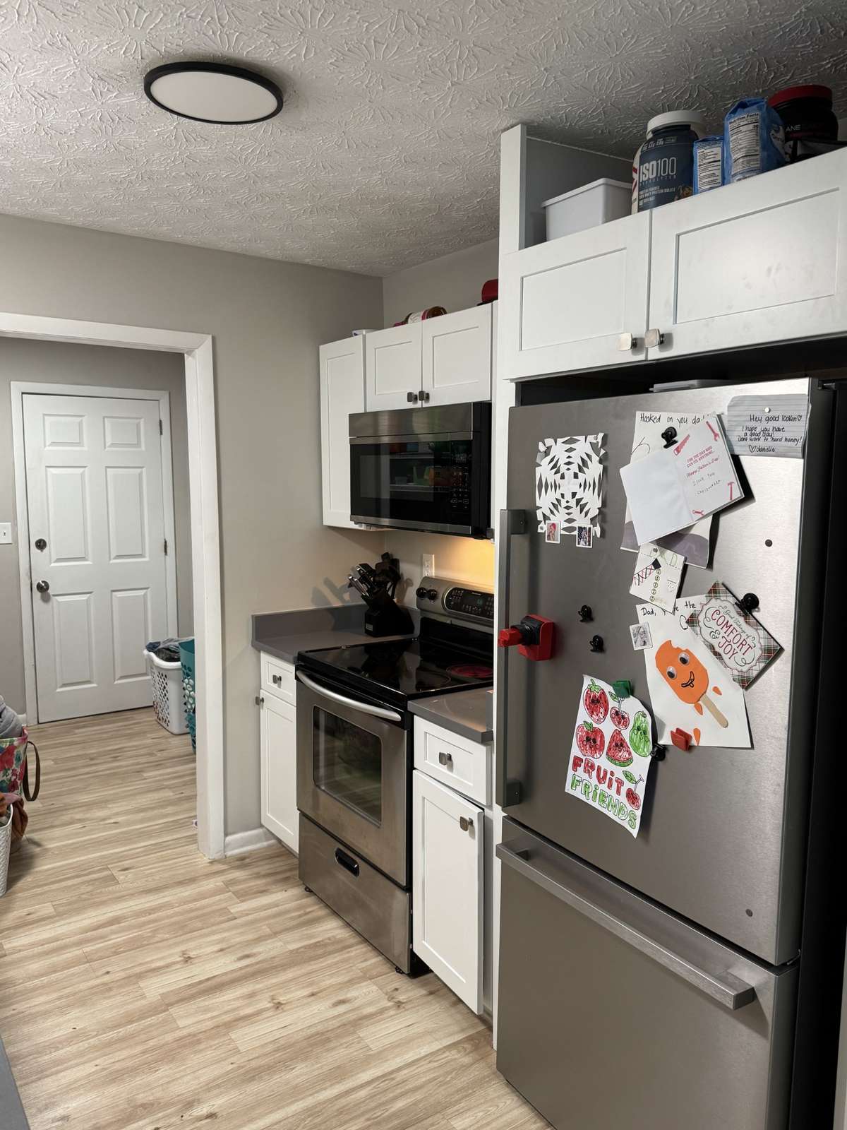 Kitchen w/Quartz Countertops and Stainless Appliances