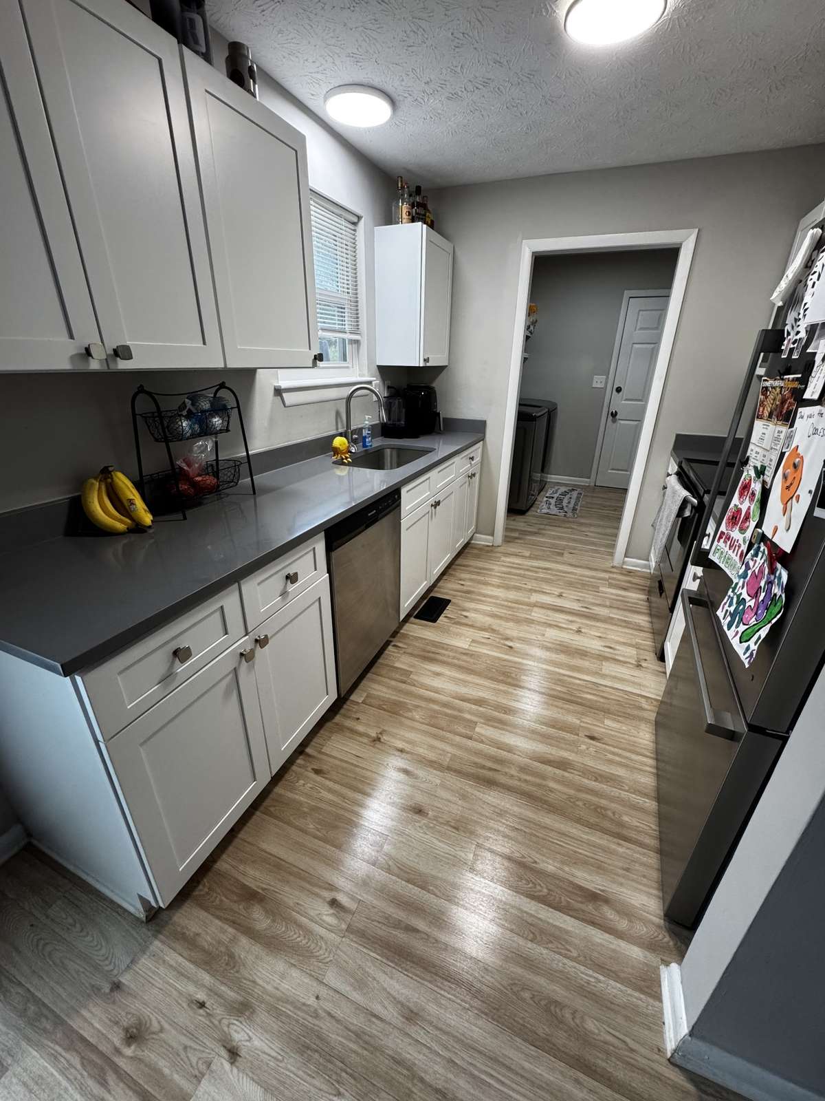 Kitchen w/Quartz Countertops and Stainless Appliances