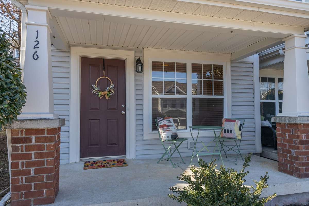 Nice covered porch freshly power washed!