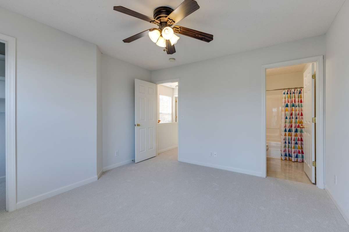 This room also has new carpet, new blinds and a Hunter Douglas ceiling fan.