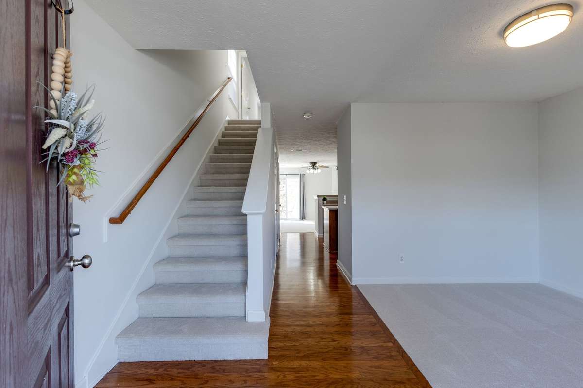 Welcome inside. There's a spacious main floor layout and 2 en-suite rooms upstairs.