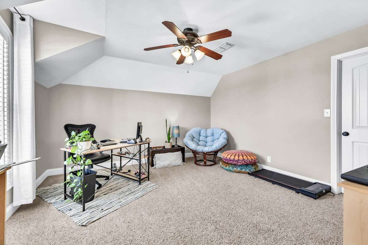BEDROOM 4 W/ WALK-IN CLOSET IS BEING USED AS AN OFFICE