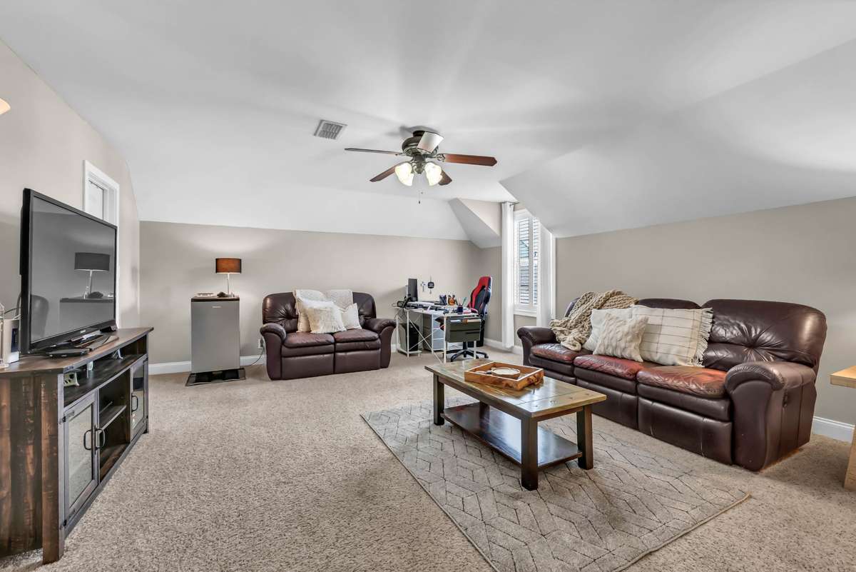 HUGE BONUS ROOM ABOVE GARAGE
