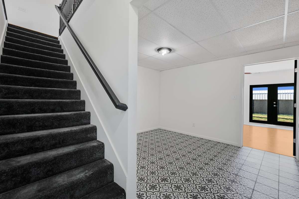 Stairs leading to the (2nd) second kitchen