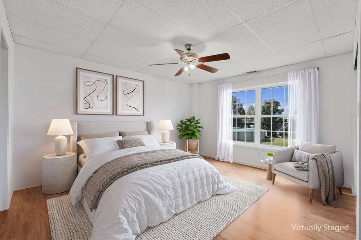 Lower Level Primary Suite - VIRTUALLY STAGED
