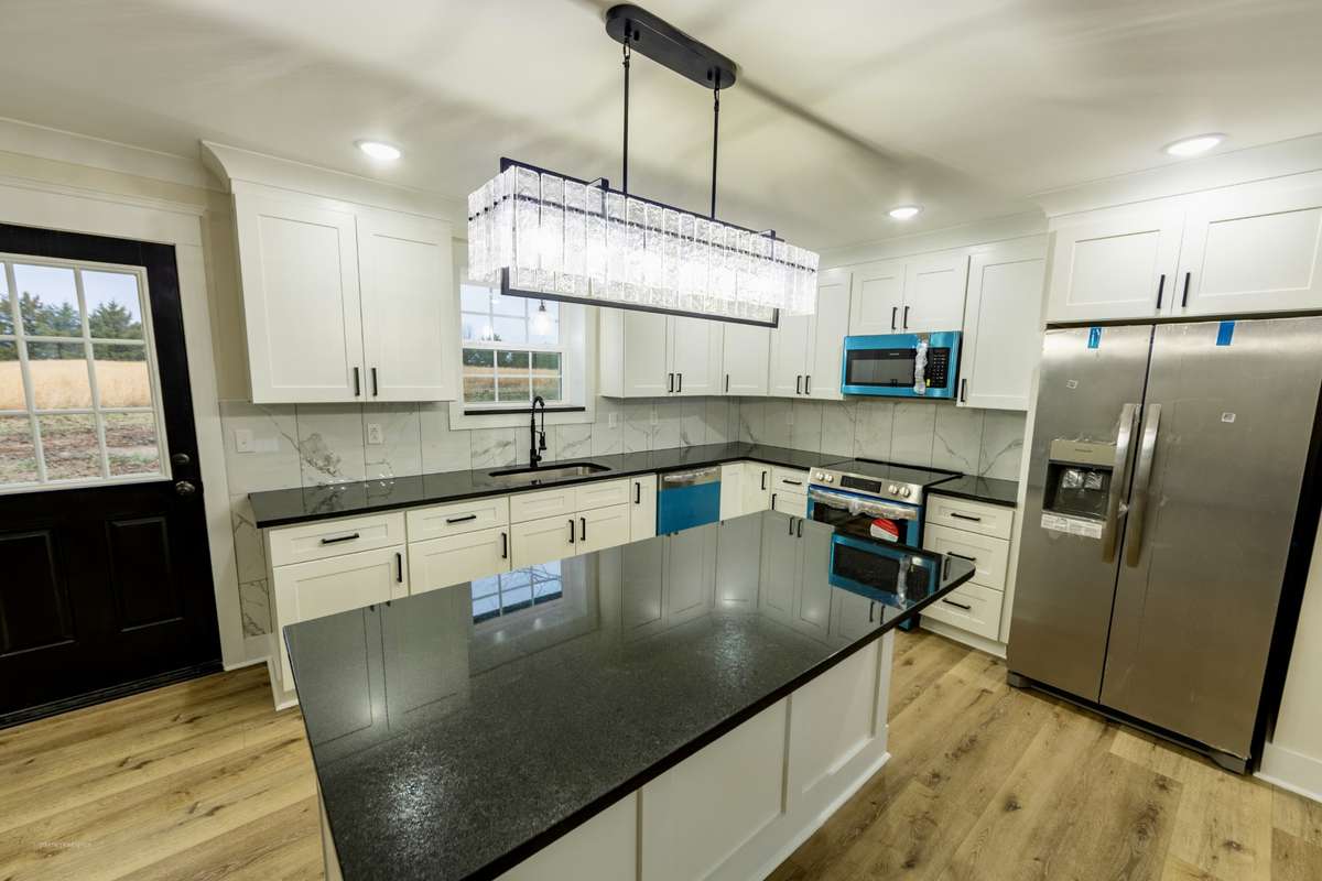All new stainless appliances in granite countertops