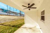 Stepping out back you'll see the covered patio area,