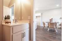 Here is a look at the powder room just off the main living area.