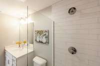 The bright white cabinets really brighten this space.