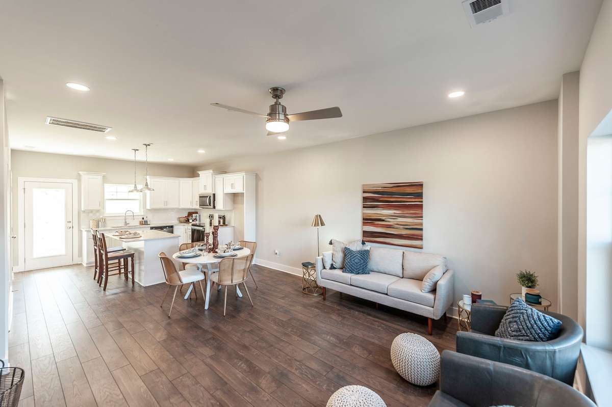Inside you'll find an open floorplan with modern finishes.