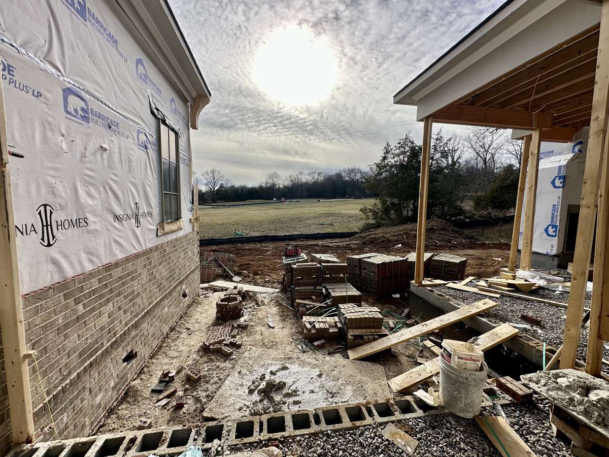 Covered rear porches will have a fireplace and grilling porch. Perfect for year-round entertainment.
*This home is under construction. Photo updated 2/12/26.