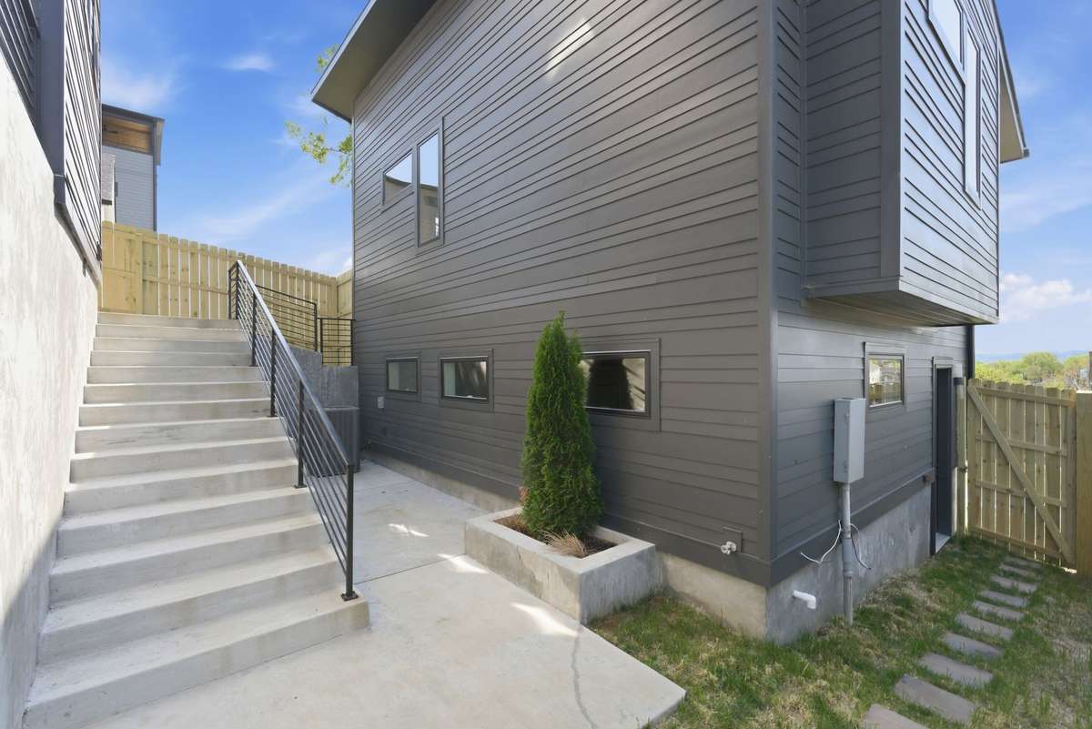 Detached two car garage with DADU above.