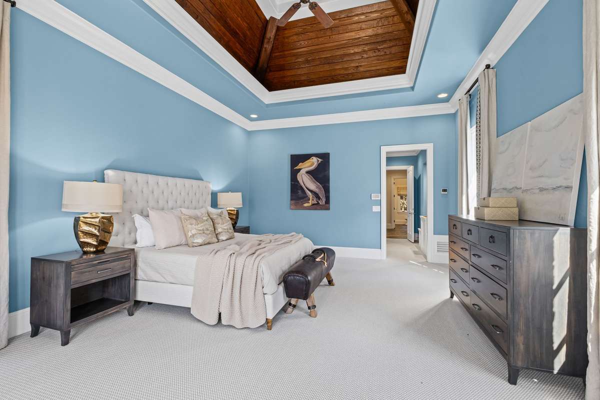 Sky-high ceilings, stunning views, and direct access to its own walk-out deck- complete with hot tub.